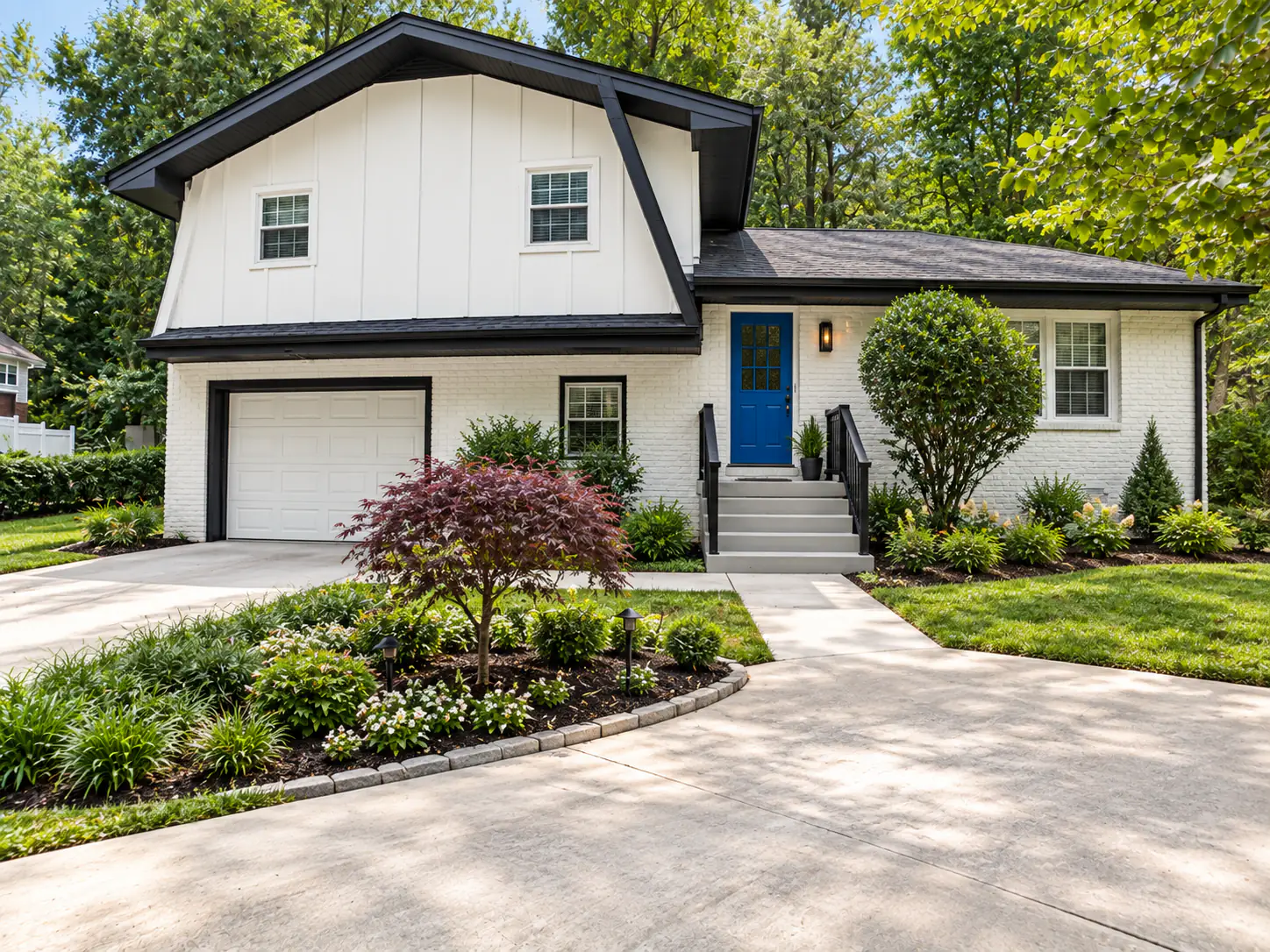 Design concept of the same house, with white painted brick, white board-and-batten siding, black trim, a blue front door and a new planted bed